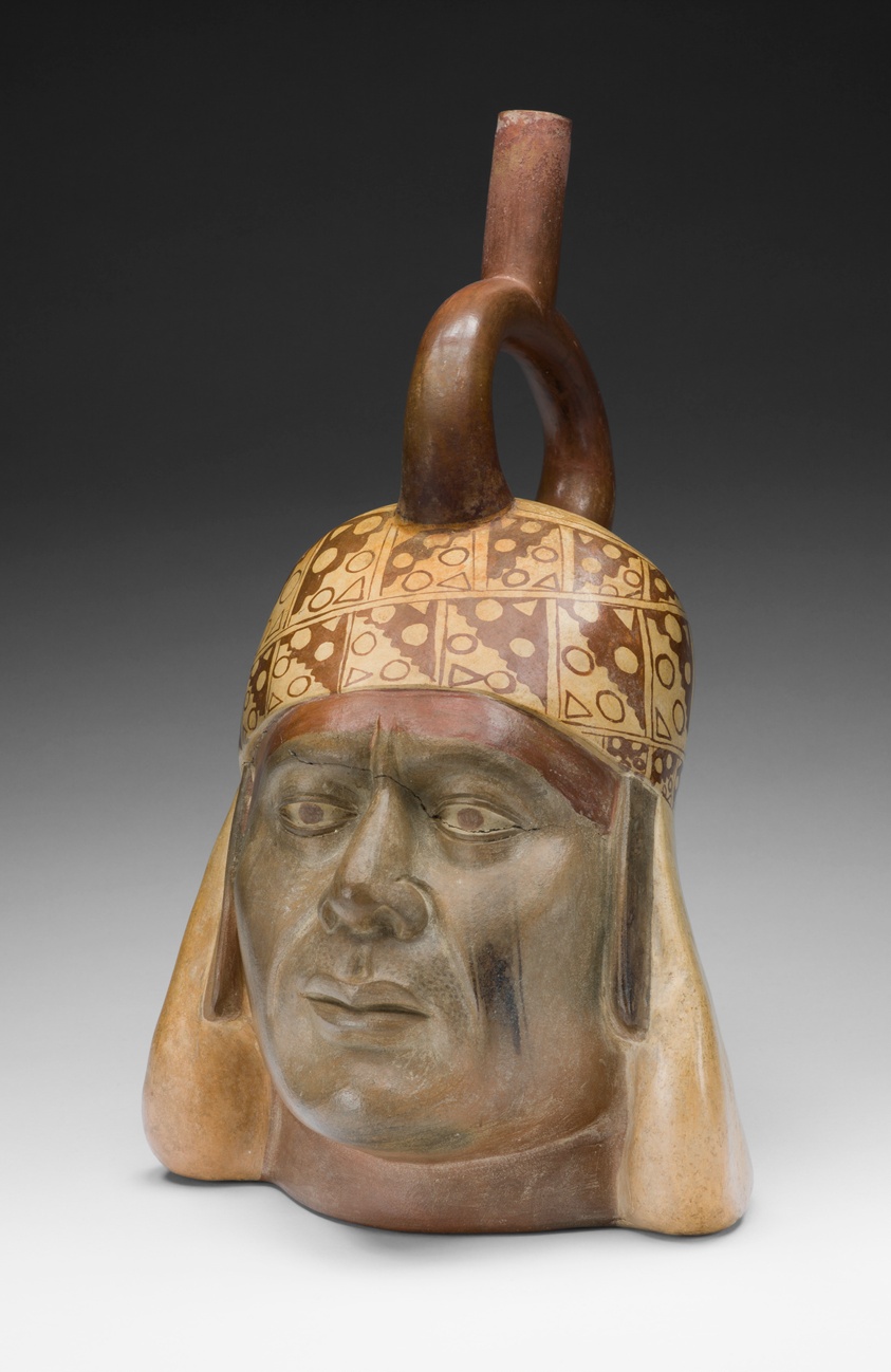 Moche portrait vessel depicting a figure wearing a gold helmet, ceramic, Peru